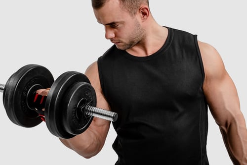 Hantle bitumiczne czy żeliwne - które wybrać do treningu w domu?