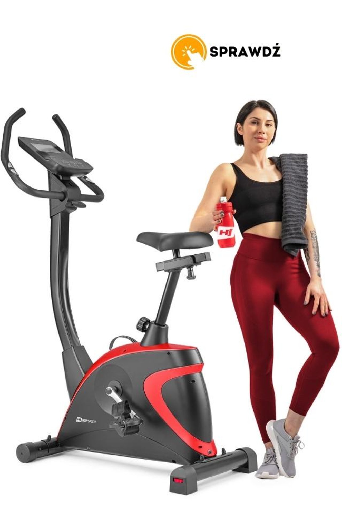 modelka pozująca obok rowera treningowego HS-005H Host marki Hop-Sport