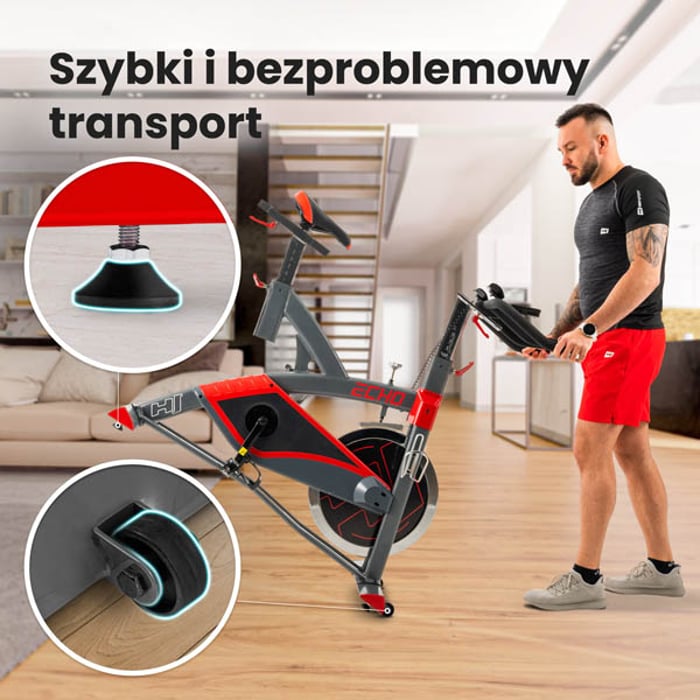 Rower spinningowy HS-055IC Echo wyposażony w rolki transportowe ułatwiające przemieszczanie rowerka