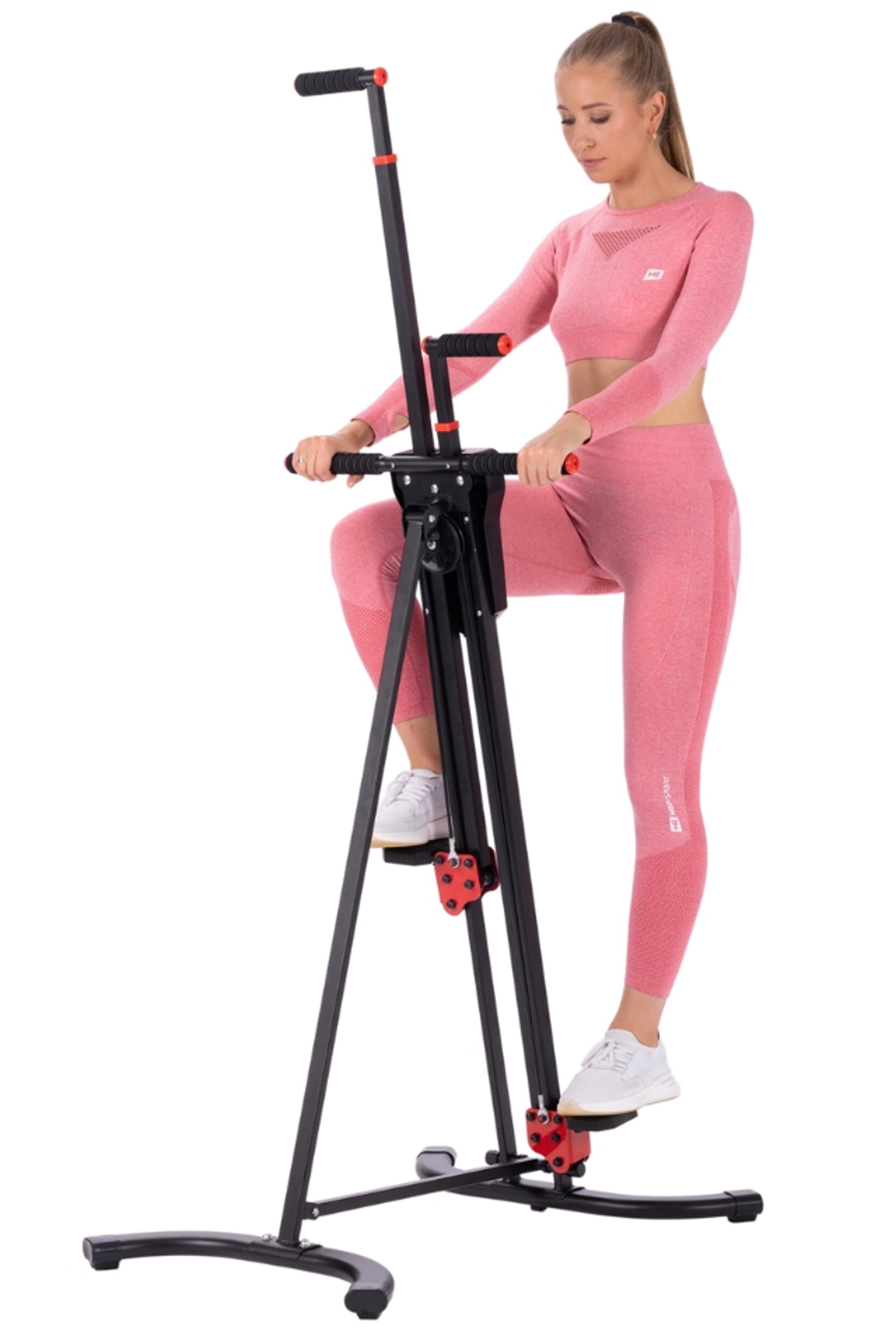 modelka ćwicząca na trenażerze wspinaczki marki Hop-Sport