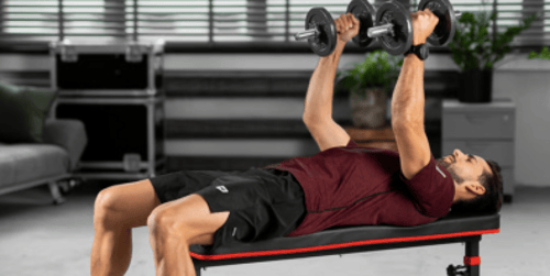 Rozpiętki na ławce poziomej – klasyczne ćwiczenie na pełną klatkę piersiową