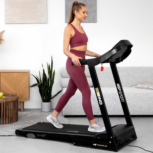 kobieta trenująca na bieżni domowej HS-1000LB Wind marki Hop-Sport