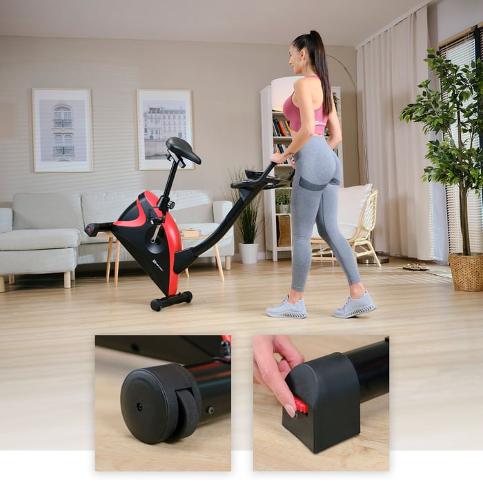 Rower stacjonarny HS-005H Host czerwony ze stopkami poziomującymi i kółkami transportowymi