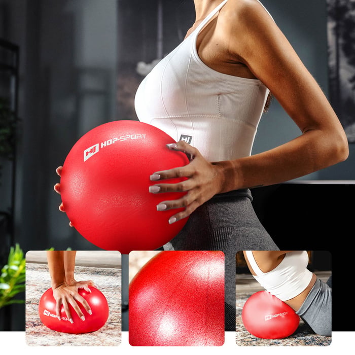 ćwicząca modelka z czerwoną piłką pilates 25cm średnicy Hop-Sport